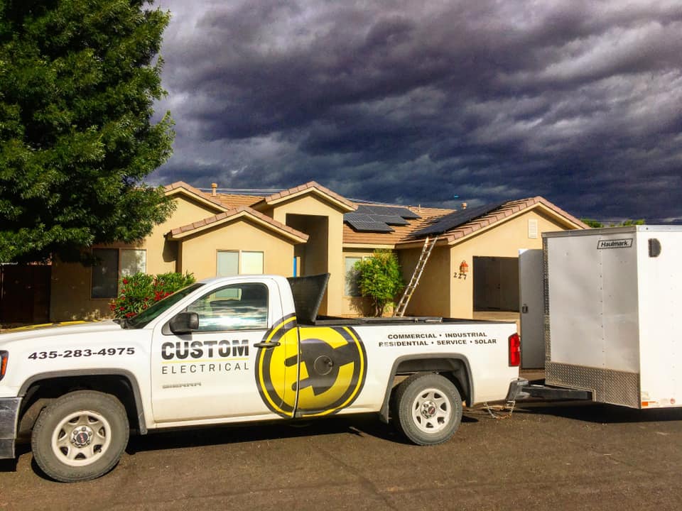 Custom Electrical truck parked outside a desert house, ready to do their home elctrical repair in Utah.