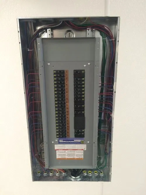 A main electrical panel in a wall, this is a part of Utah electrical troubleshooting steps.